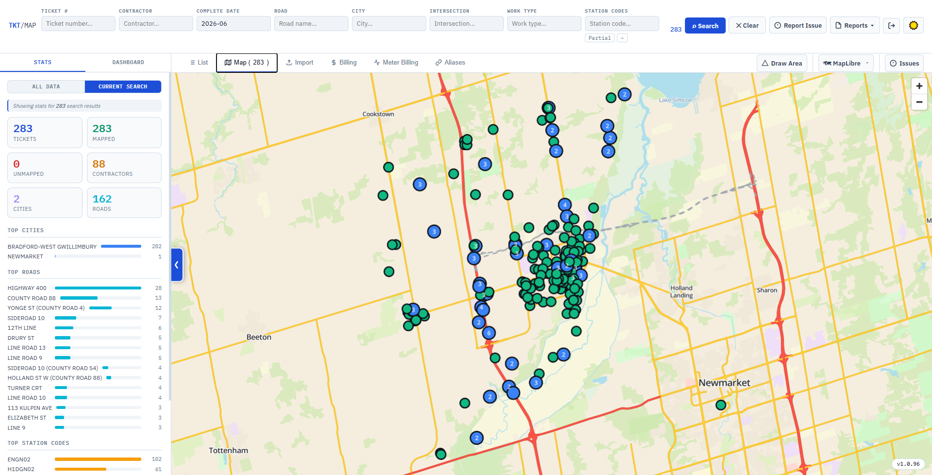 Geo Mapper's main window: search fields for contractor, road, city, intersection, work type and station codes above a table of matching historical tickets.